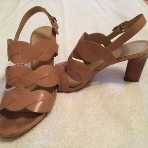 Light tan stacked heel sandals by Via Spigia